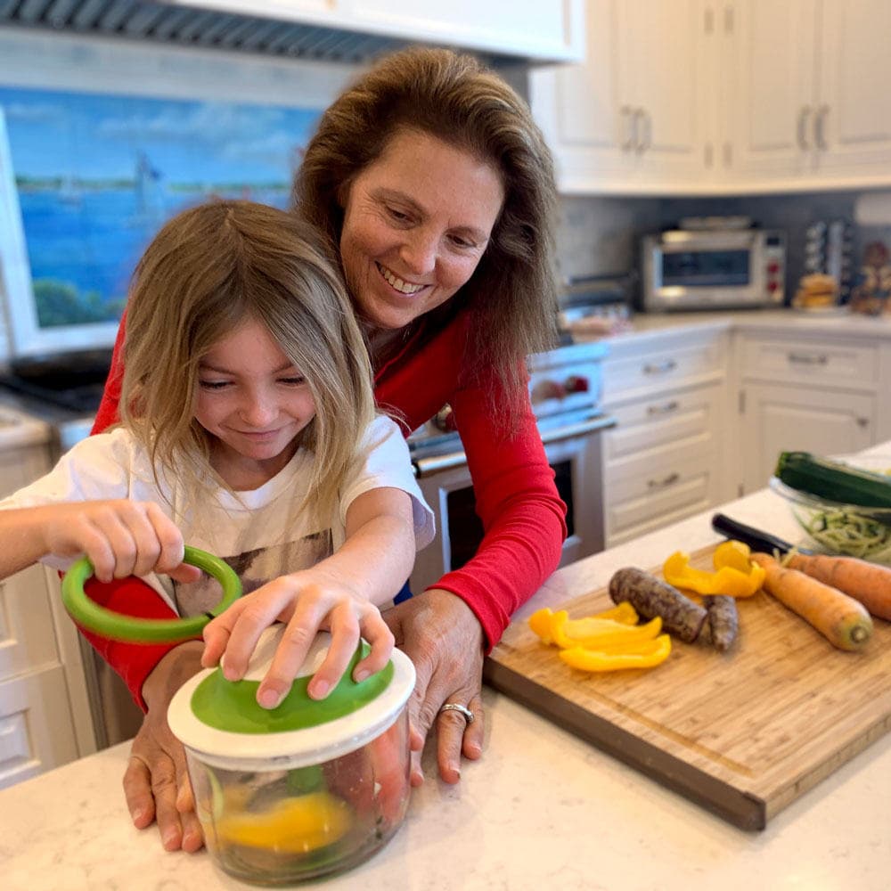 Debbie Sweeney cooking with her daughter